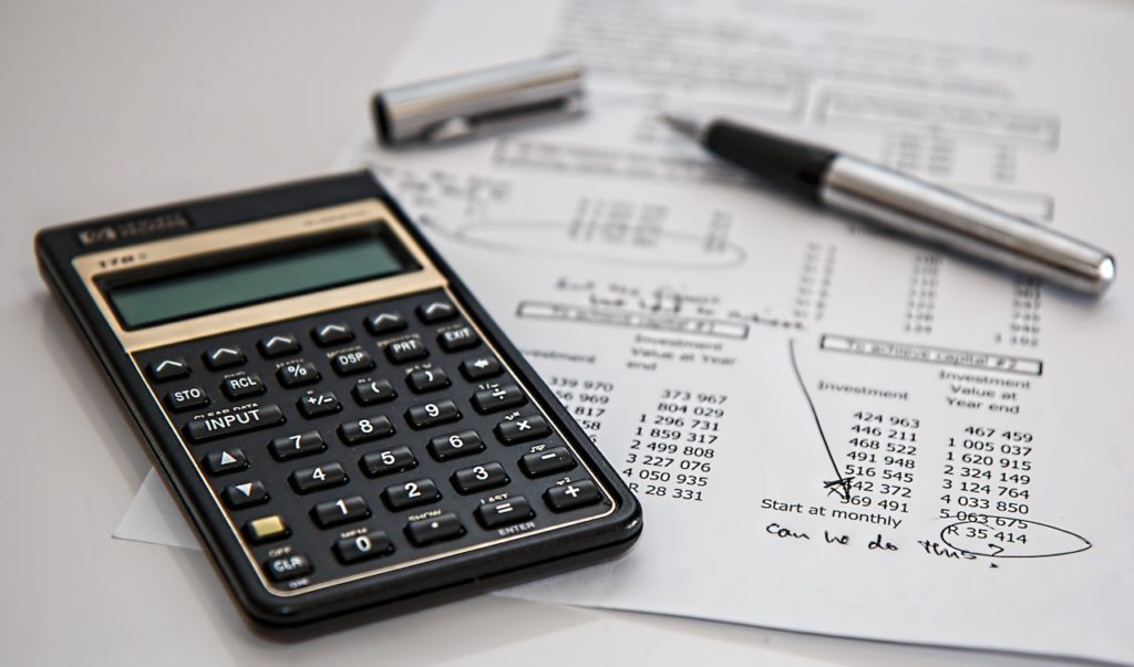  A calculator on top of a loan payment calculation.